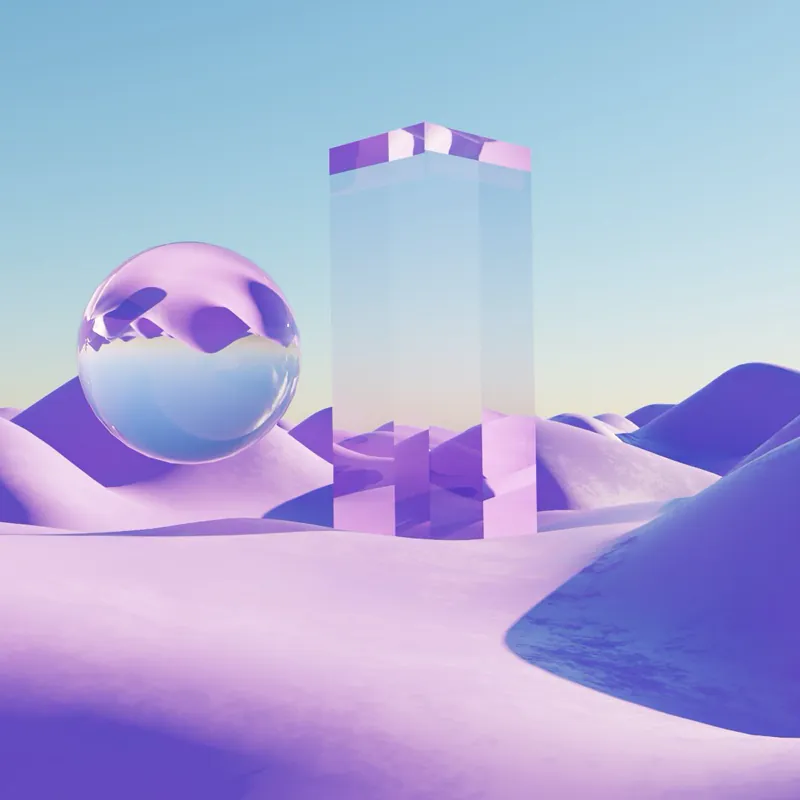 Chrome sphere and glass monolith in pastel purple dunes